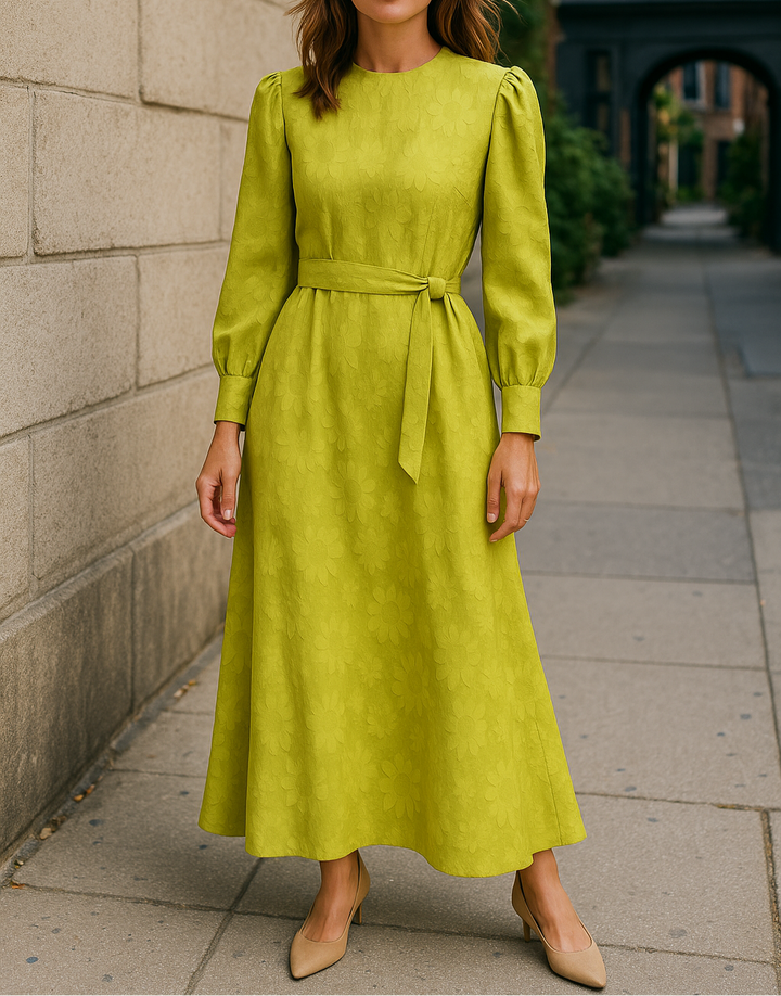 Modest lime green long-sleeve midi dress with floral texture and matching belt – ideal for hijabi women seeking elegant everyday or special occasion wear