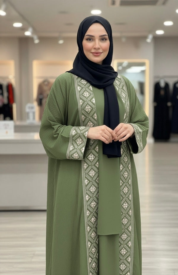 Abaya d’hiver verte avec broderies géométriques élégantes
